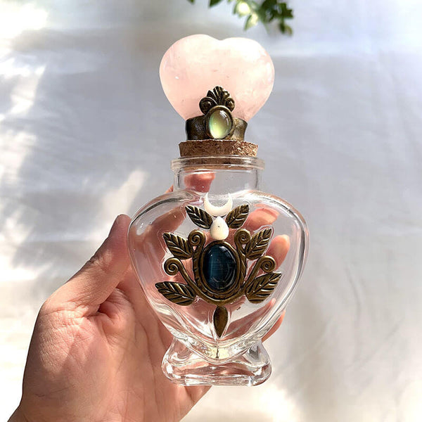 LEAF TOTEM MAGIC BOTTLE WITH ROSE QUARTZ HEART CAP