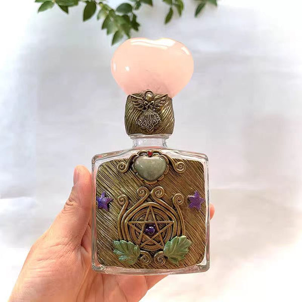 PENTACLE  MAGIC BOTTLE WITH ROSE QUARTZ HEART CAP